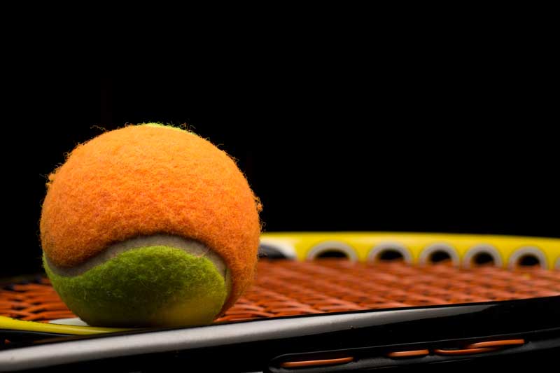 Photo of youth tennis ball and racquet